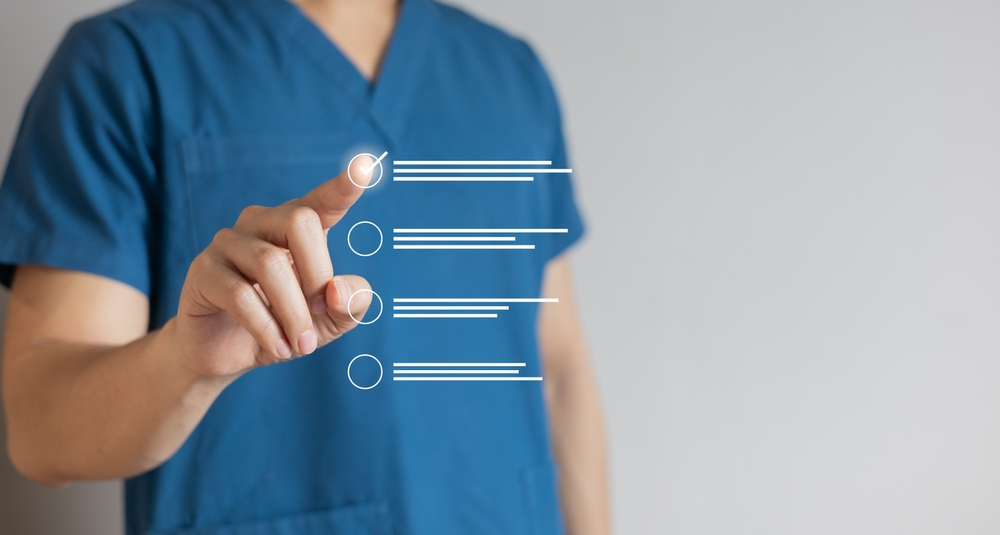 Close,Up,Young,General,Practitioner,Hand,Check,Box,On,Medical